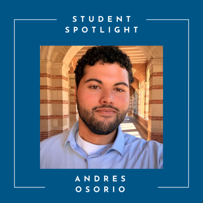 UCLA student with beard, standing in the Royce Hall arches.