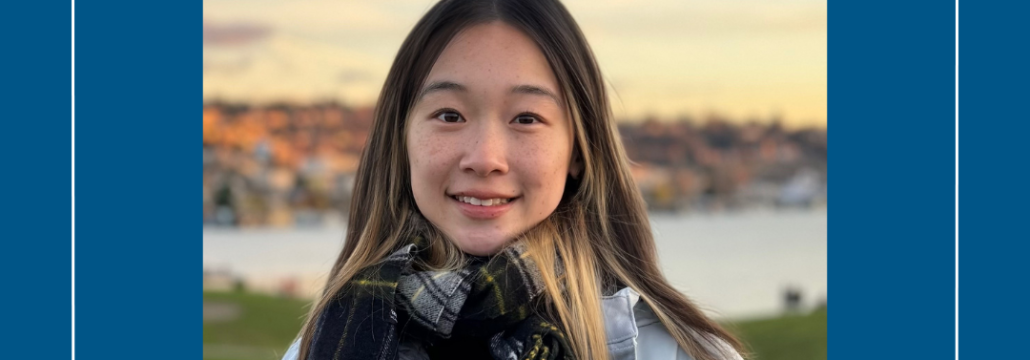 Young woman in a jacket and plaid scarf