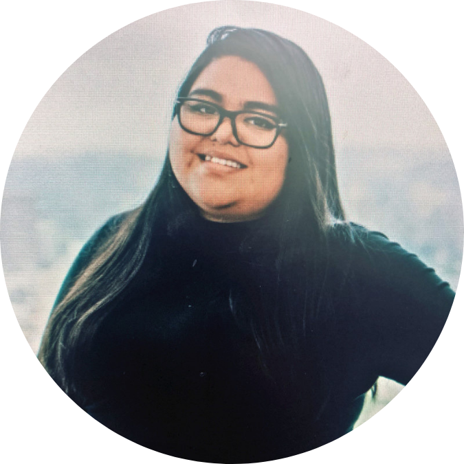 Silveria Alvarado Luna headshot Person with long dark hair, glasses